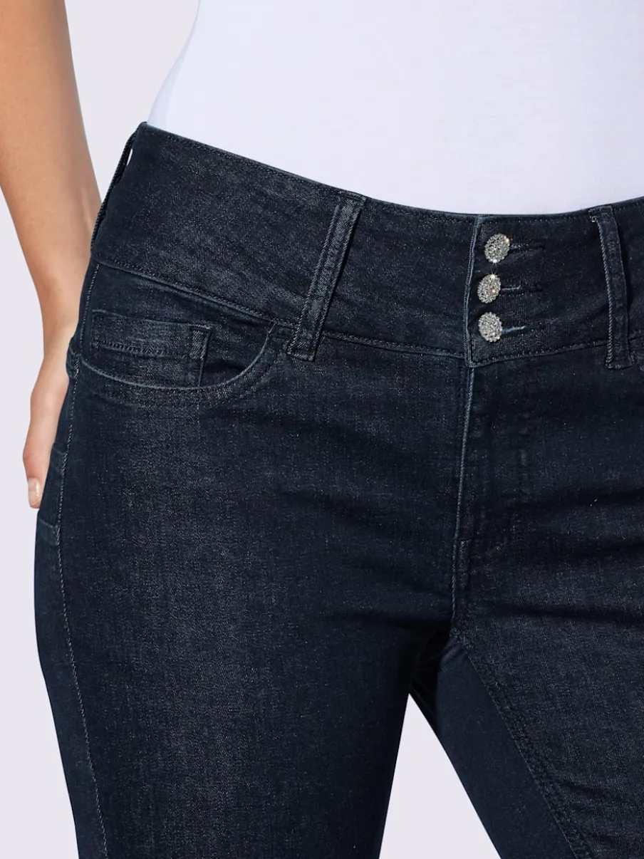 Jean push-up avec revers à perles et pierres décoratives