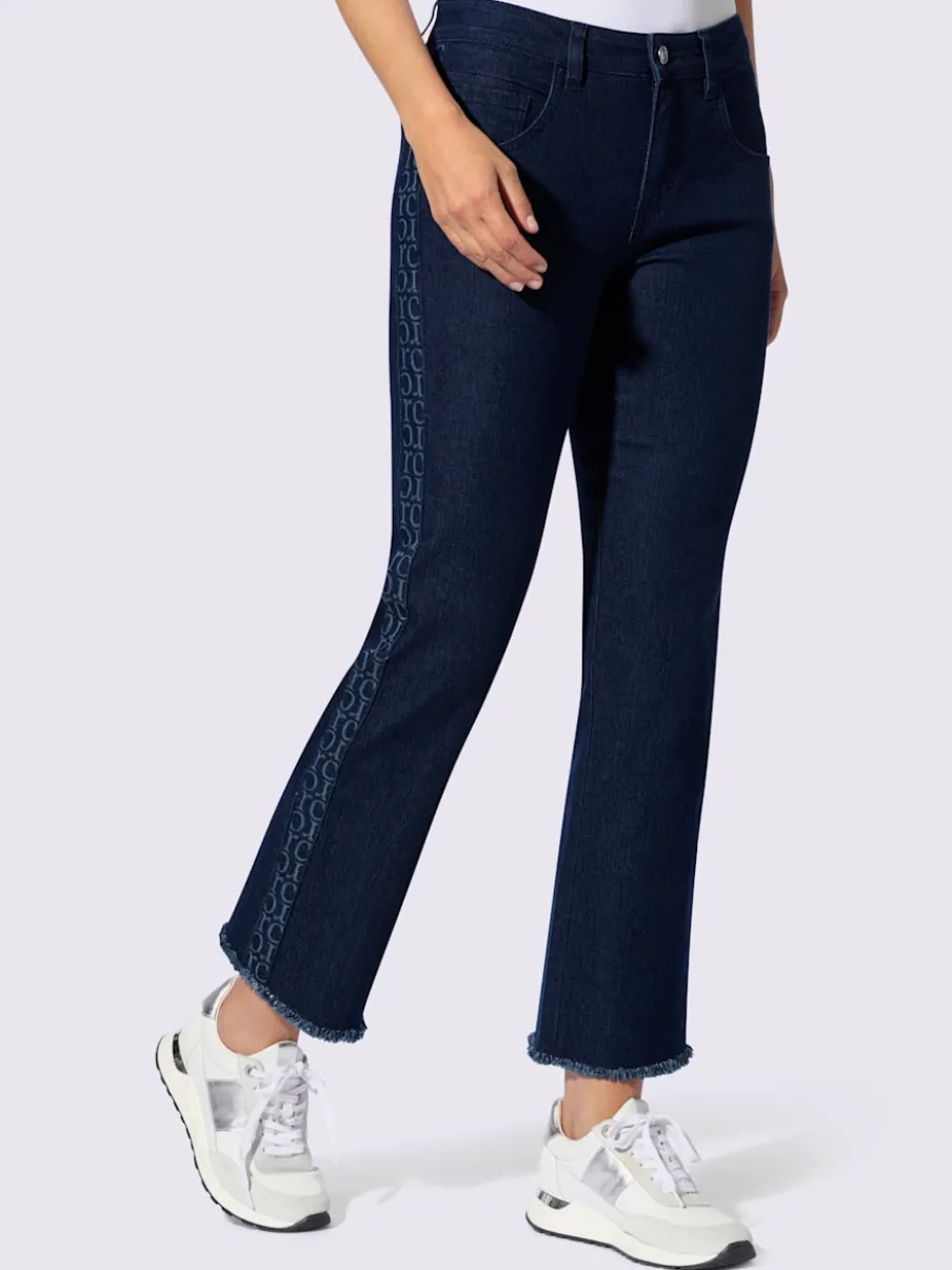 Jean push-up cinq poches avec rayures sur les côtés