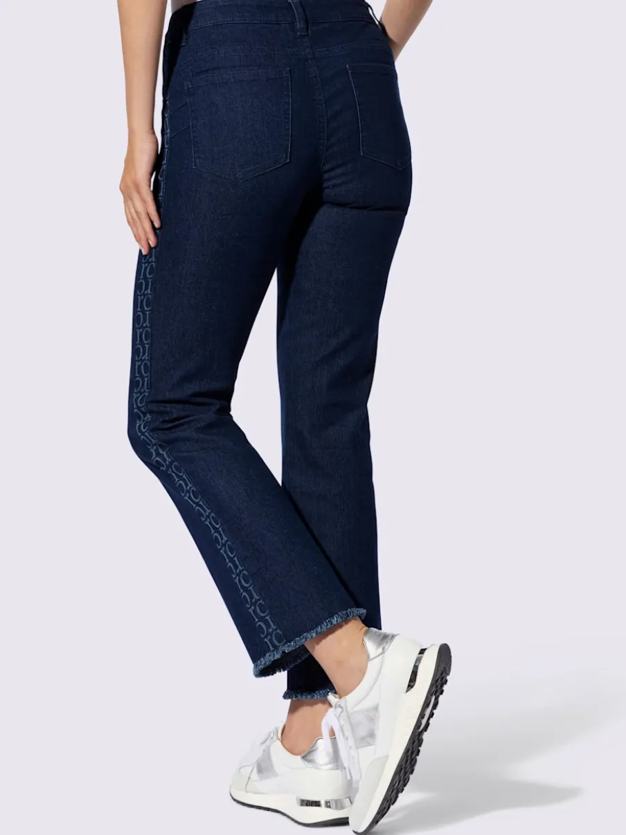 Jean push-up cinq poches avec rayures sur les côtés