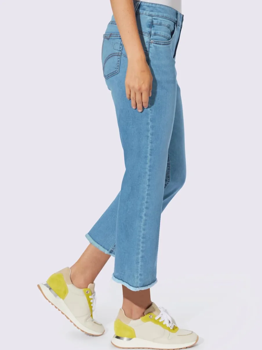 Jean push-up jambes évasées avec poches fantaisie brillantes
