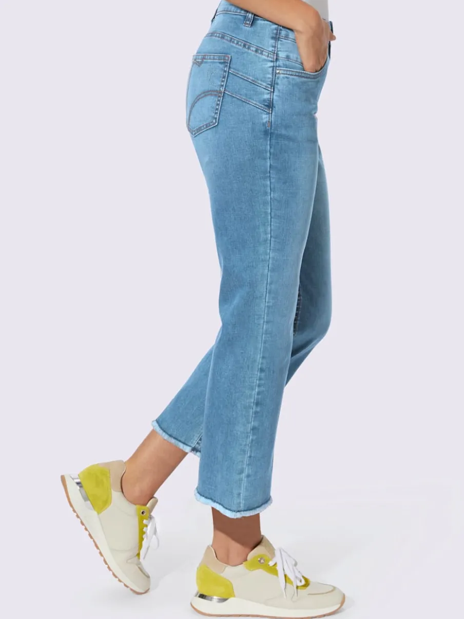 Jean push-up jambes évasées avec poches fantaisie brillantes