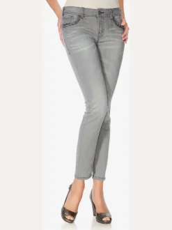 Jean skinny avec broderie et effet ventre plat