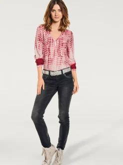 Jean skinny avec broderie et effet ventre plat