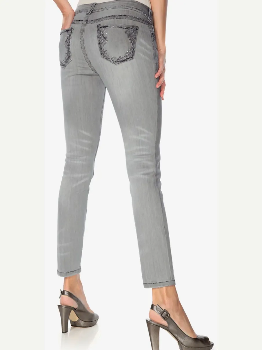 Jean skinny avec broderie et effet ventre plat