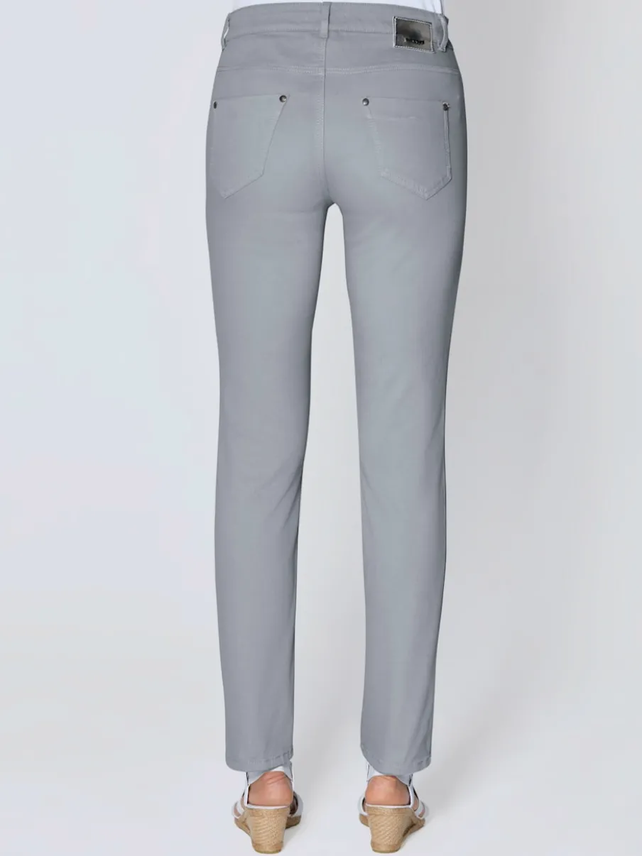 Jean skinny avec quatre poches et rivets décoratifs