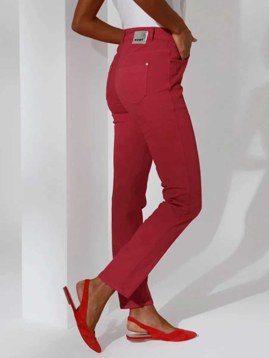 Jean skinny avec quatre poches et rivets décoratifs