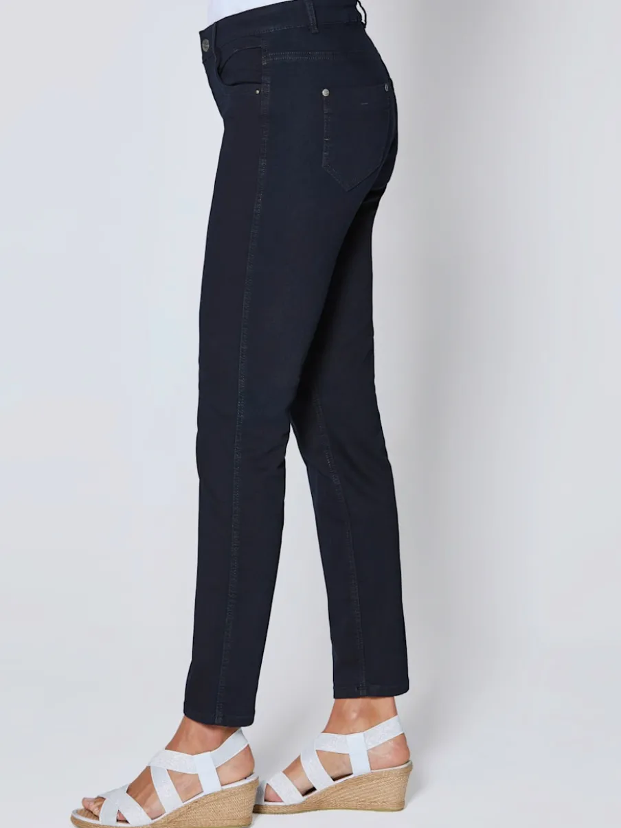 Jean skinny avec quatre poches et rivets décoratifs