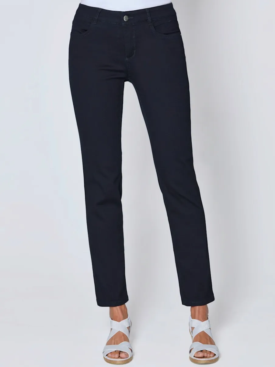 Jean skinny avec quatre poches et rivets décoratifs