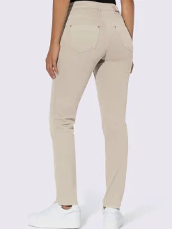 Jean skinny avec quatre poches et rivets décoratifs