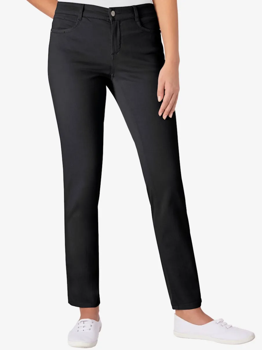 Jean skinny avec quatre poches et rivets décoratifs