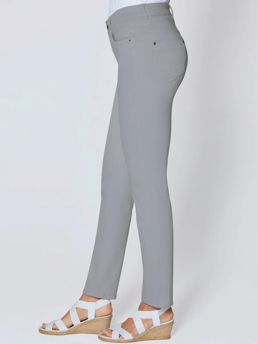 Jean skinny avec quatre poches et rivets décoratifs