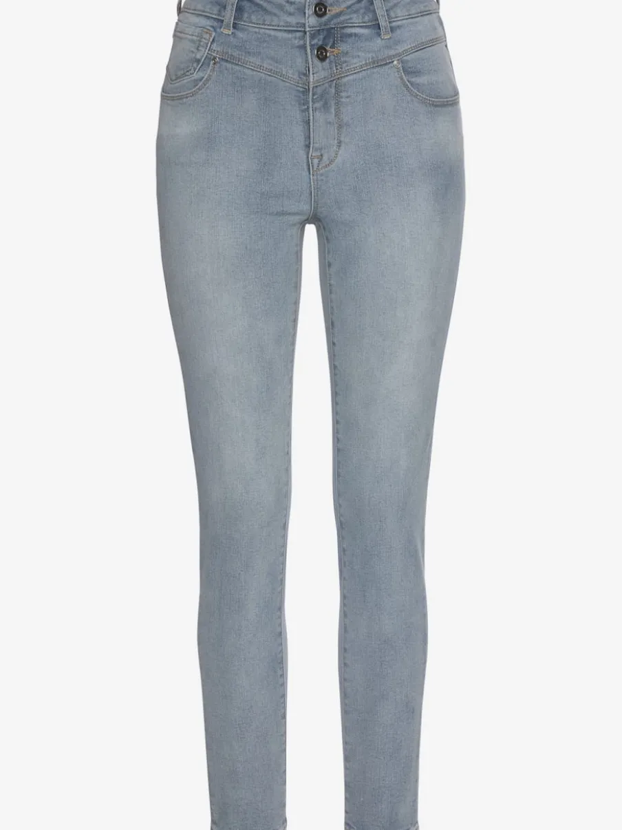 Jean skinny fit avec patte de boutonnage visible et coupe 5 poches