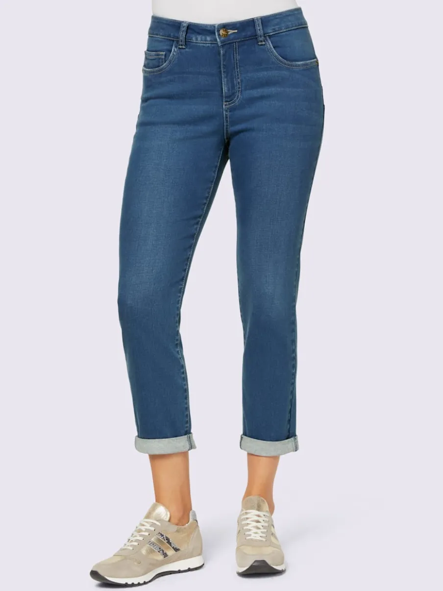 Jean slim cinq poches effet push-up délavé usé