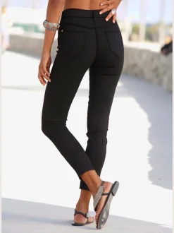Jegging 7/8 coupe étroite avec poches décoratives et denim élastique