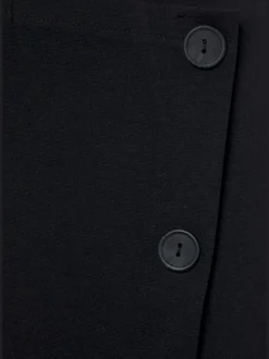 Jupe-culotte style skort avec effet cache-cœur décoratif
