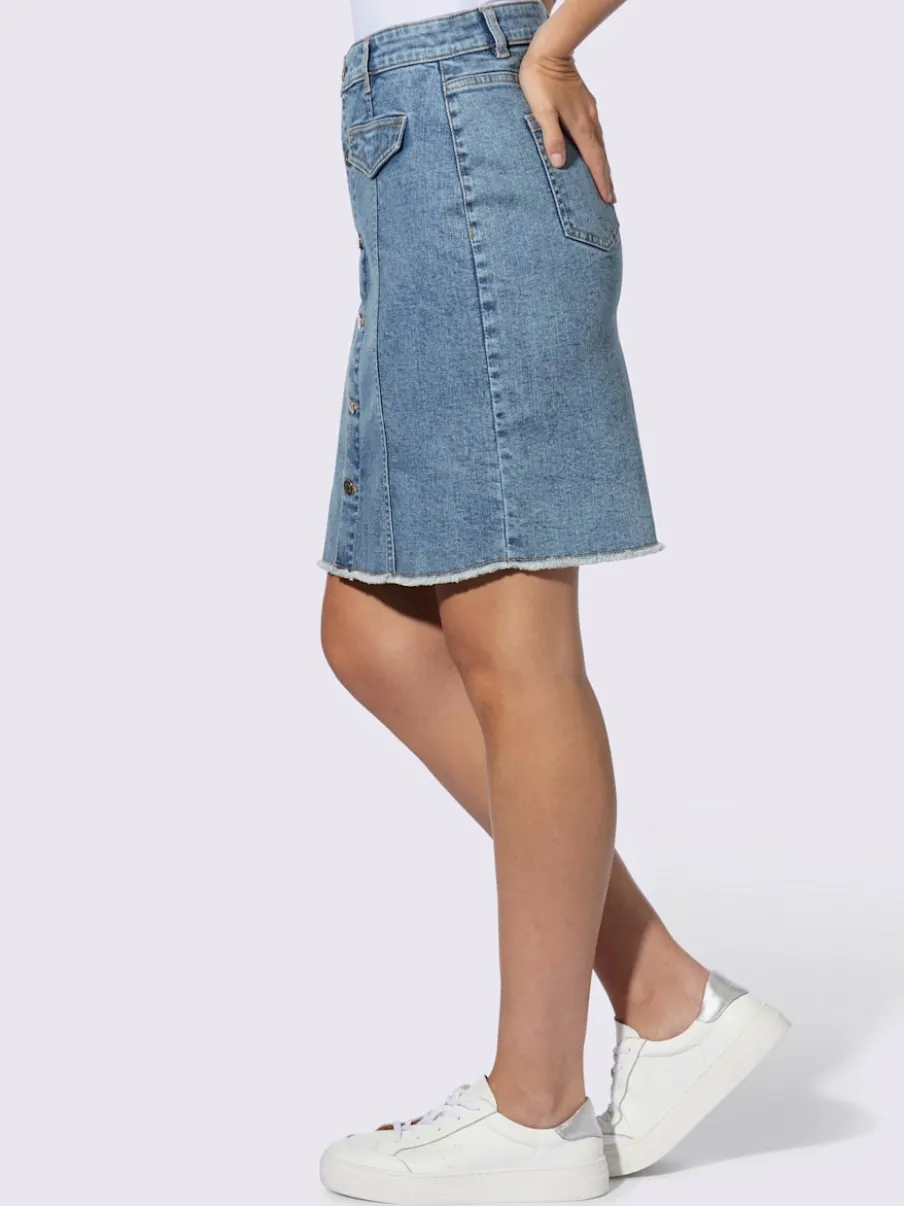 Jupe en jean avec poches arrière et ourlet à franges