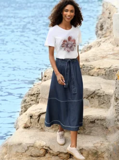 Jupe en jean coupe évasée avec poches latérales