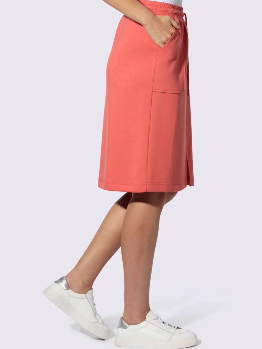 Jupe en jersey avec ceinture élastique et poches plaquées