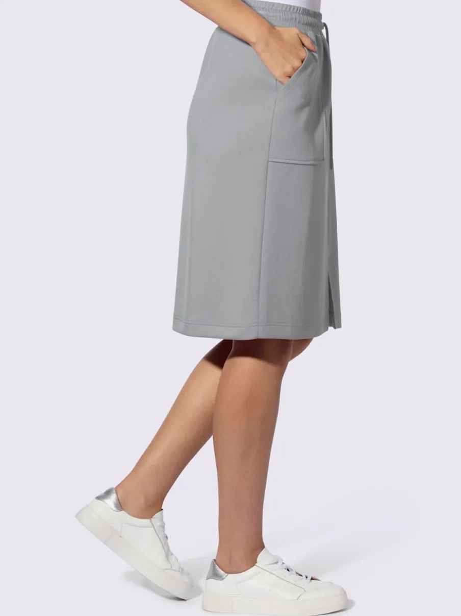 Jupe en jersey avec ceinture élastique et poches plaquées