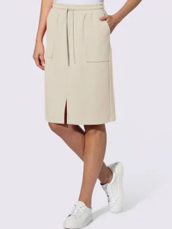 Jupe en jersey avec ceinture élastique et poches plaquées