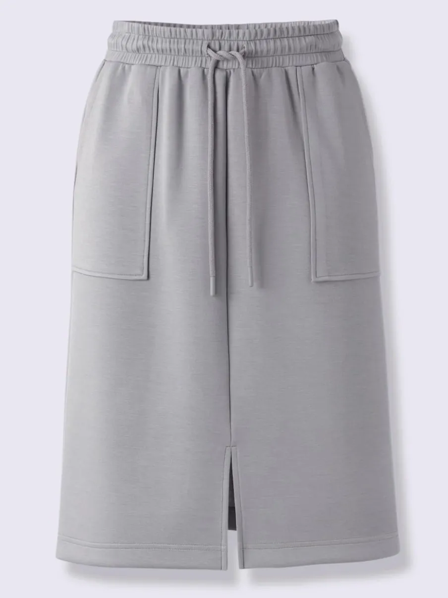 Jupe en jersey avec ceinture élastique et poches plaquées
