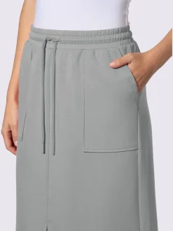 Jupe en jersey avec ceinture élastique et poches plaquées