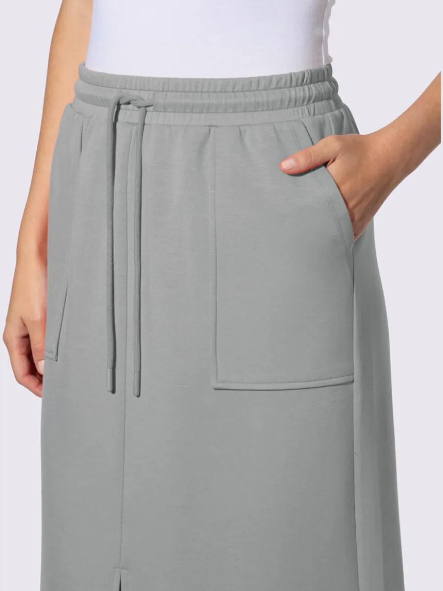Jupe en jersey avec ceinture élastique et poches plaquées