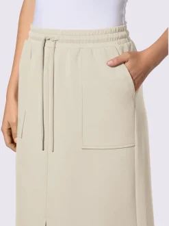 Jupe en jersey avec ceinture élastique et poches plaquées