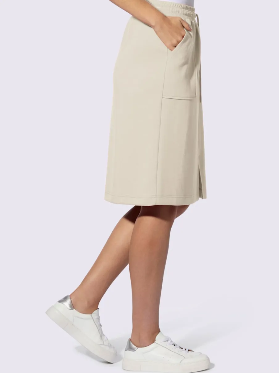 Jupe en jersey avec ceinture élastique et poches plaquées