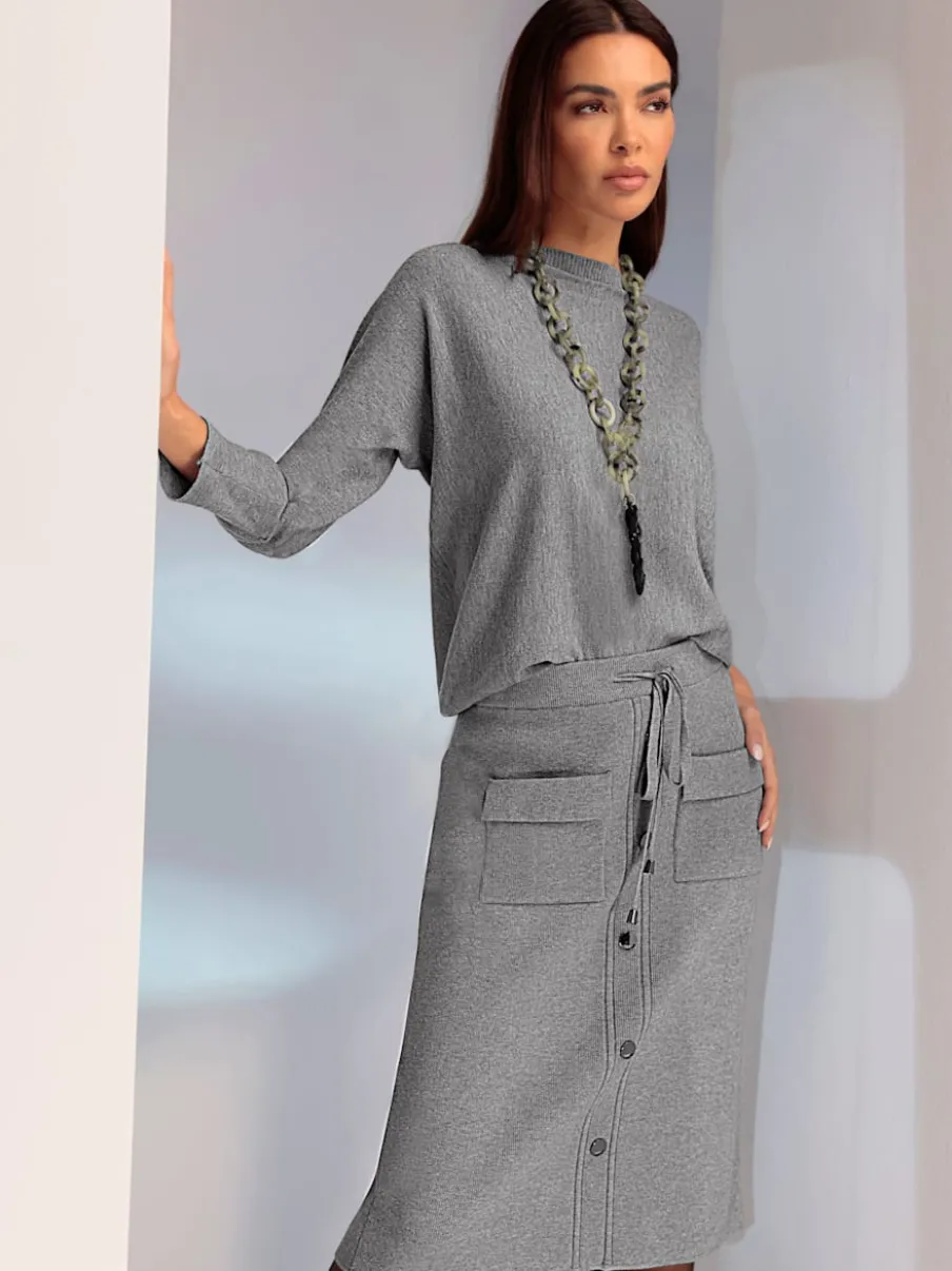 Jupe en tricot avec ceinture élastique et boutons décoratifs