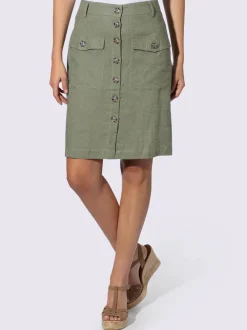 Jupe estivale en lin avec patte de boutonnage et poches.