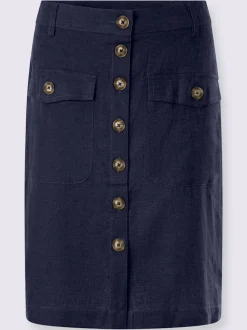 Jupe estivale en lin avec patte de boutonnage et poches.