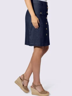 Jupe estivale en lin avec patte de boutonnage et poches.