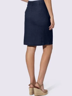 Jupe estivale en lin avec patte de boutonnage et poches.