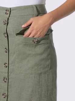Jupe estivale en lin avec patte de boutonnage et poches.