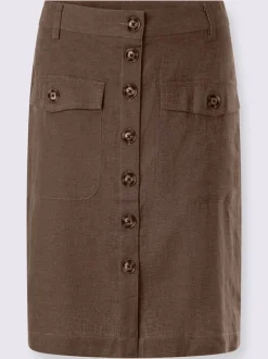 Jupe estivale en lin avec patte de boutonnage et poches.