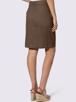 Jupe estivale en lin avec patte de boutonnage et poches.
