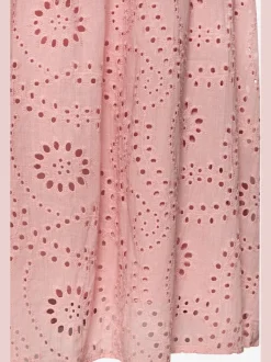 Jupe longue d'été à broderie ajourée avec plis flatteurs
