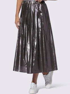 Jupe plissée avec ceinture élastique en tissu.