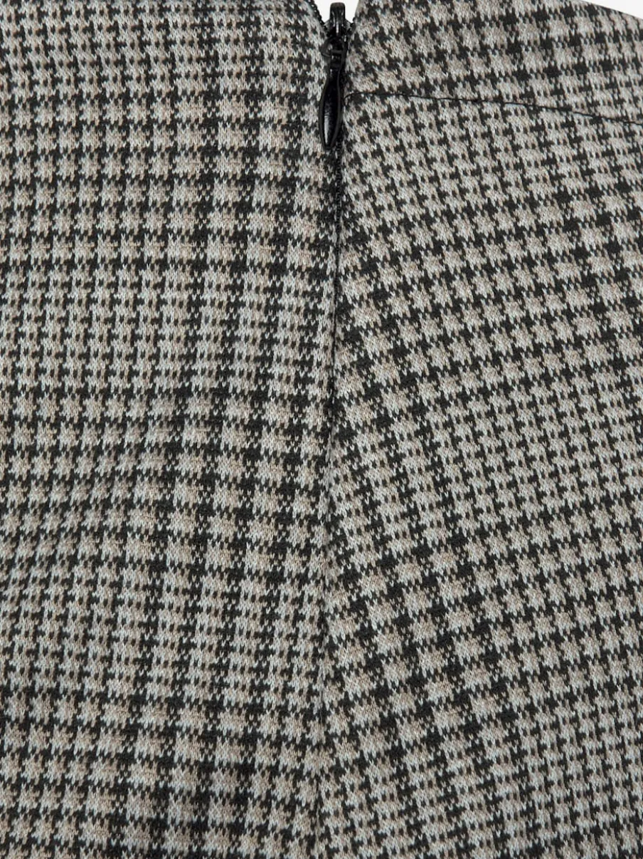 Jupe skort à carreaux avec boutons décoratifs sur le devant