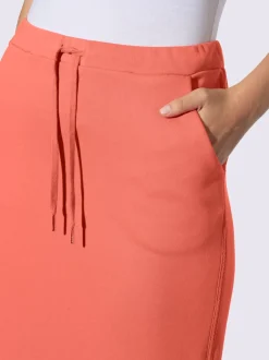 Jupe sweat avec ceinture élastique et poches pratiques