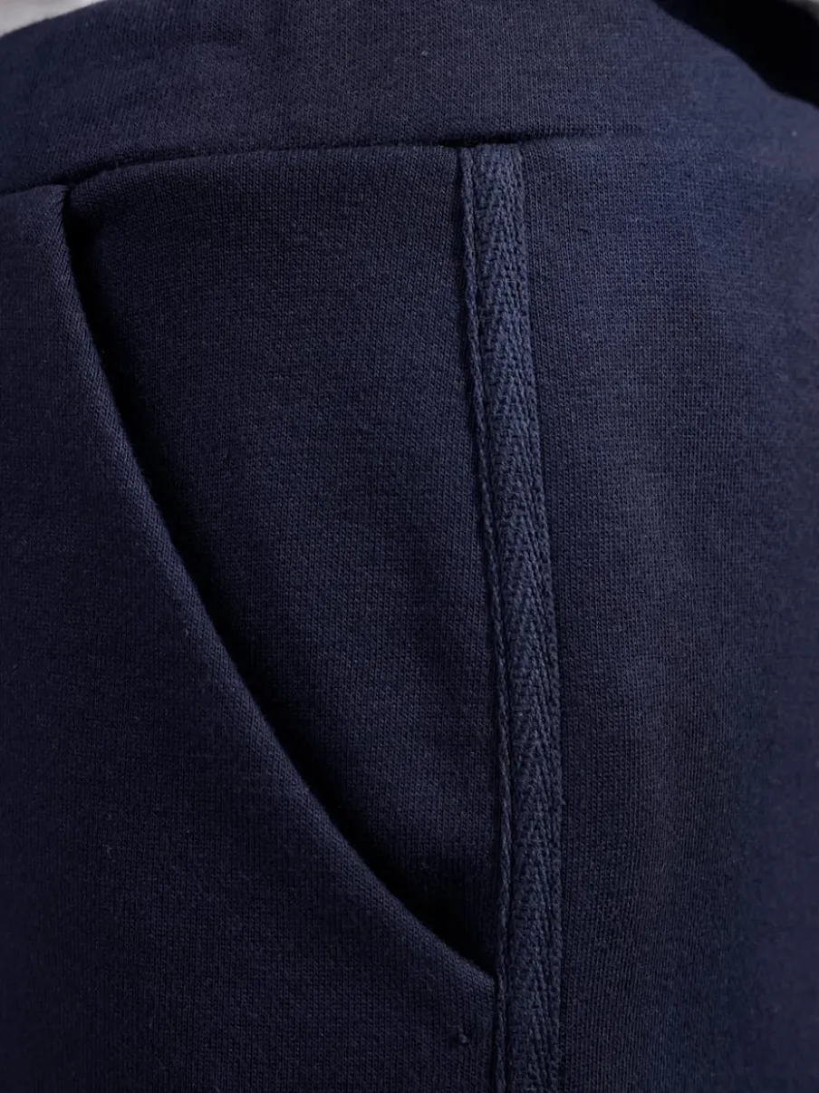 Jupe sweat avec ceinture élastique et poches pratiques