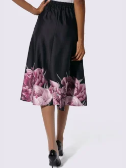 Jupe tissée évasée avec ceinture élastique et bordure florale
