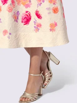 Jupe évasée avec motif floral et poches latérales