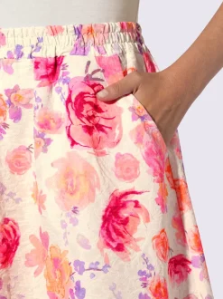 Jupe évasée avec motif floral et poches latérales