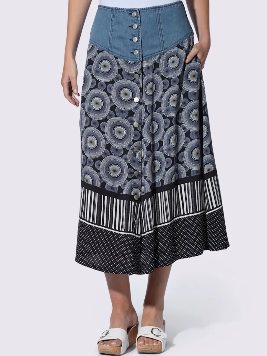Jupe évasée en coton avec patte de boutonnage et poches