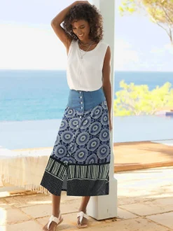 Jupe évasée en coton avec patte de boutonnage et poches