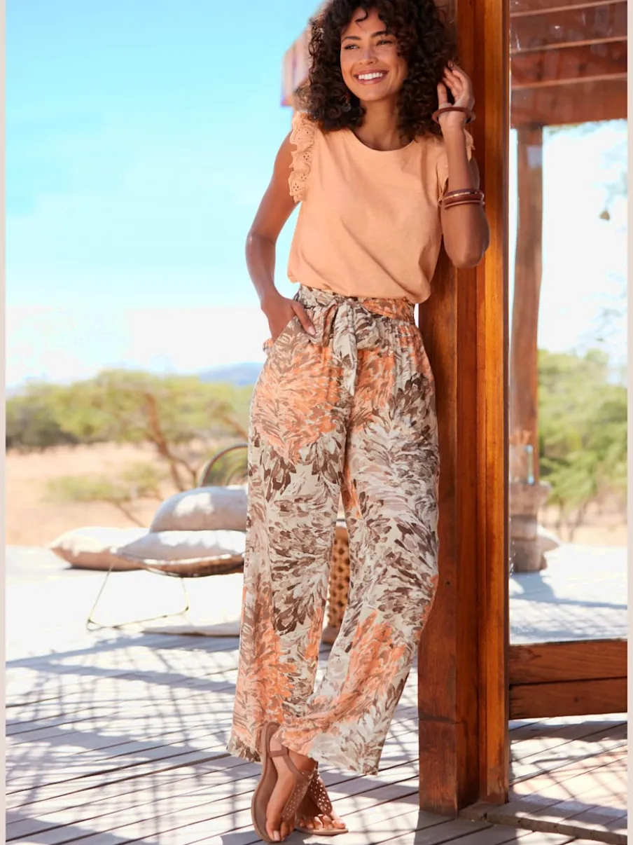 Large pantalon en tissu en viscose avec ceinture élastique et poches
