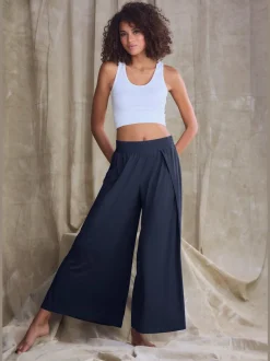 Large sarouel doux avec ceinture élastique fluide et chevauchants