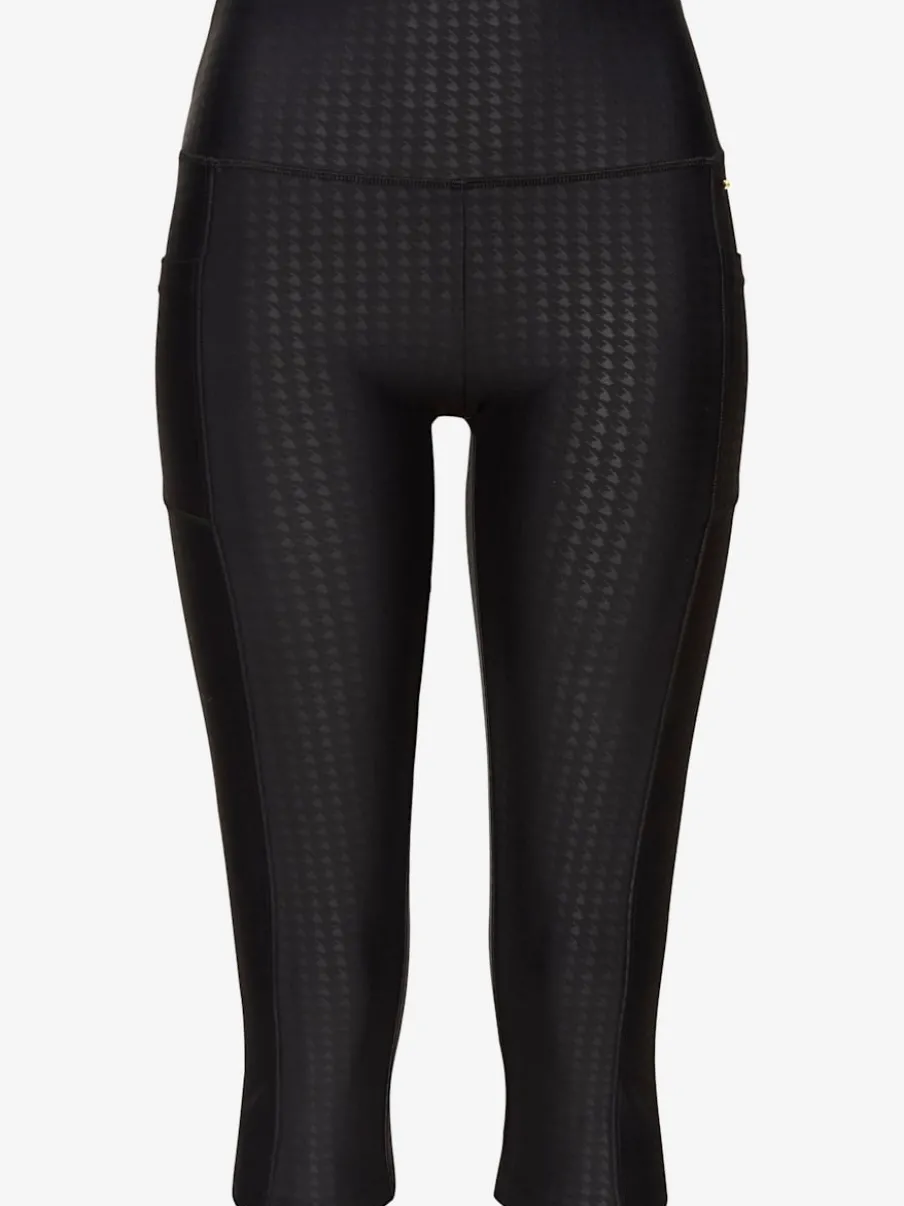 Legging court à large ceinture avec poches et extensible